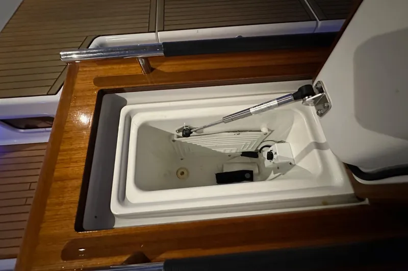 Slide: The Image of Open storage compartment on 2021 Beneteau Oceanis 55.1 yacht deck. - 32