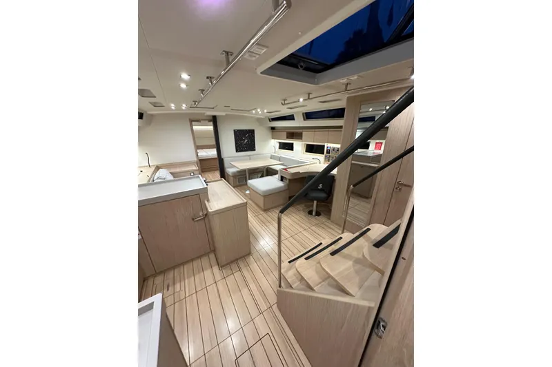 Slide: The Image of Luxurious interior of 2021 Beneteau Oceanis 55.1 yacht with modern design and wood finish. - 48
