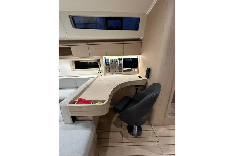 Slide: The Image of Modern navigation station in 2021 Beneteau Oceanis 55.1 yacht interior. - 57