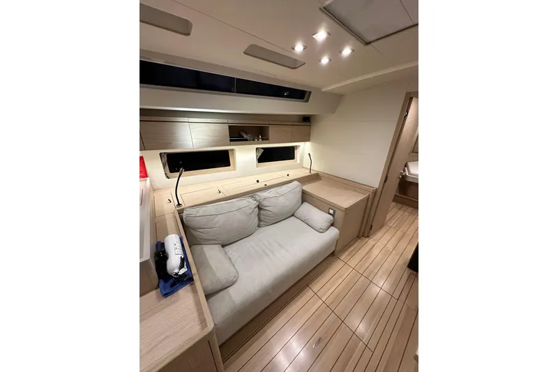Slide: The Image of Luxurious interior of 2021 Beneteau Oceanis 55.1 yacht with modern furnishings. - 62