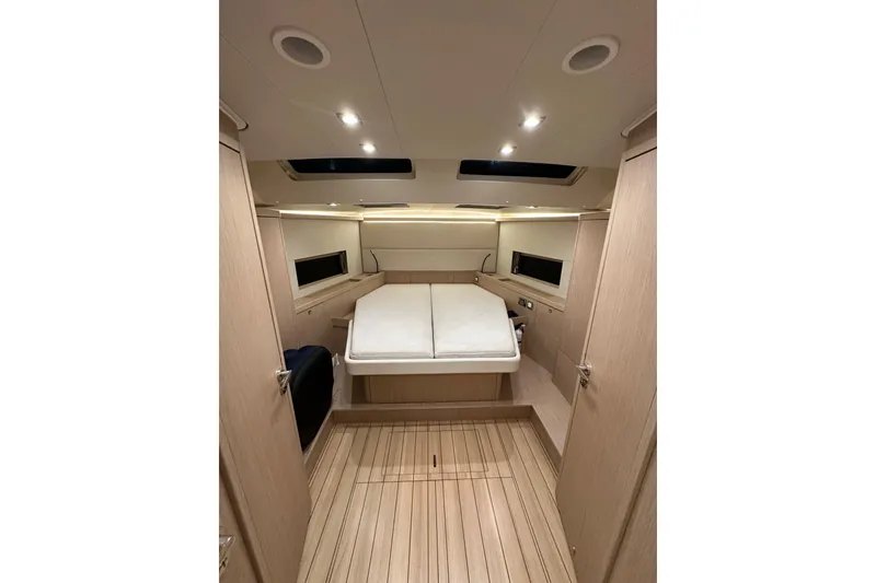 Slide: The Image of Luxurious interior cabin of 2021 Beneteau Oceanis 55.1 yacht, featuring modern design and wood finish. - 67
