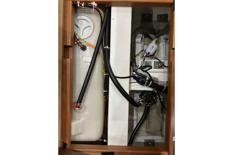 Slide: The Image of 2021 Beneteau Oceanis 55.1 yacht interior wiring and plumbing system. - 86