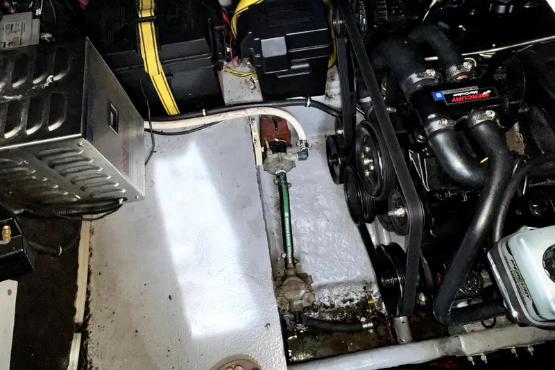 Slide: The Image of Engine compartment of a 2000 Monterey 322 Cruiser with visible components and wiring. - 44