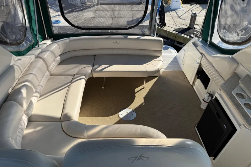 Slide: The Image of Luxurious interior of a 2000 Monterey 322 Cruiser with beige seating and carpet. - 7
