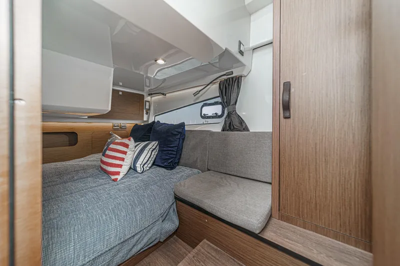 Slide: The Image of Luxurious cabin interior of 2023 Beneteau Antares 11 Fly with cozy bedding. - 50