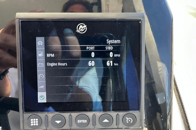 Slide: The Image of Display screen of 2023 Beneteau Antares 11 Fly showing engine hours and RPM. - 64