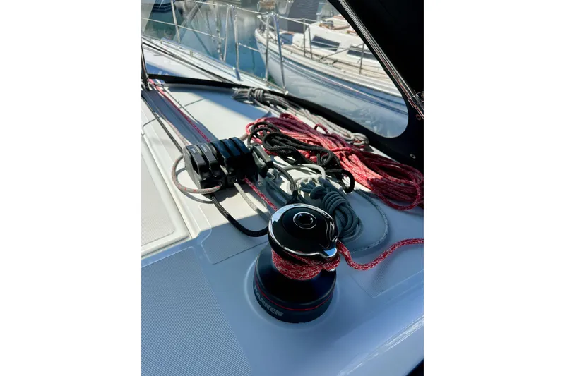 Slide: The Image of Deck of 2022 Jeanneau Sun Odyssey 410 with winch and ropes. - 34