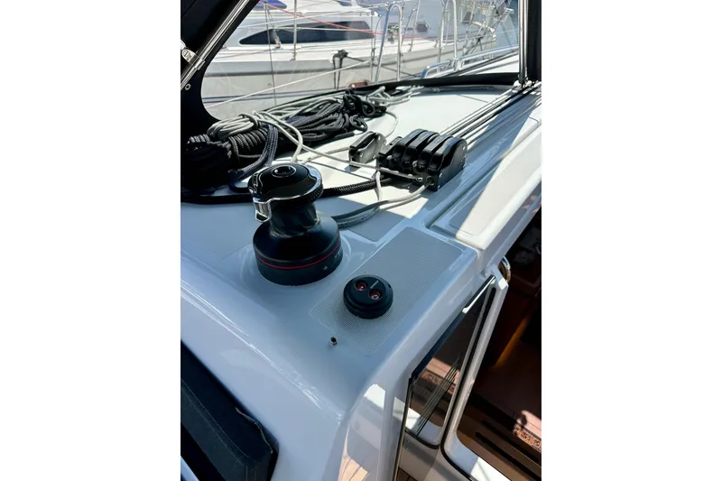 Slide: The Image of Deck of 2022 Jeanneau Sun Odyssey 410 sailboat with winch and ropes. - 35