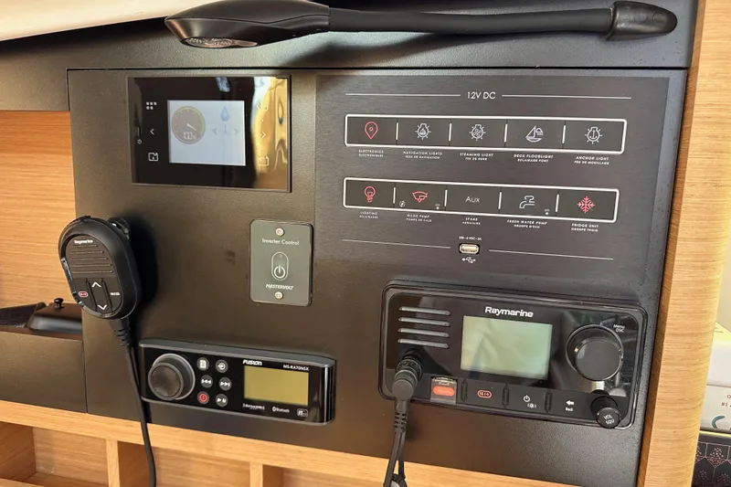 Slide: The Image of Control panel of 2022 Jeanneau Sun Odyssey 410 yacht with navigation and communication systems. - 41