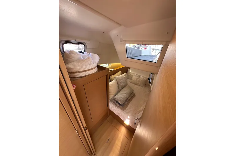 Slide: The Image of Cozy cabin interior of 2022 Jeanneau Sun Odyssey 410 sailboat. - 49