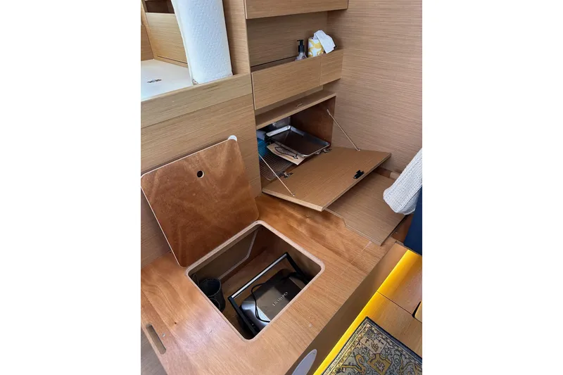 Slide: The Image of Interior storage compartments on 2022 Jeanneau Sun Odyssey 410 sailboat. - 67
