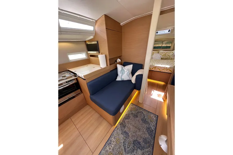 Slide: The Image of Interior of 2022 Jeanneau Sun Odyssey 410 yacht with cozy seating and modern design. - 71