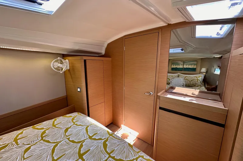 Slide: The Image of Interior of 2022 Jeanneau Sun Odyssey 410 yacht, featuring cozy cabin and modern design. - 82
