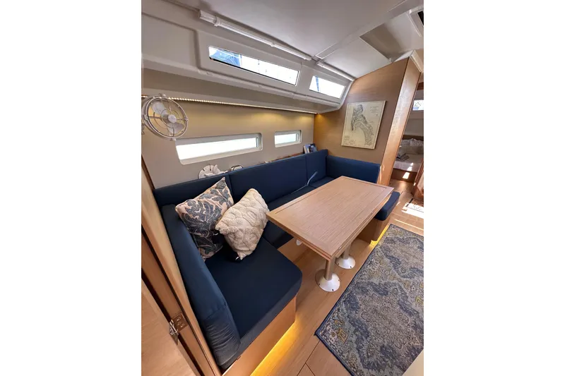 Slide: The Image of Interior of 2022 Jeanneau Sun Odyssey 410 yacht with cozy seating and elegant decor. - 86