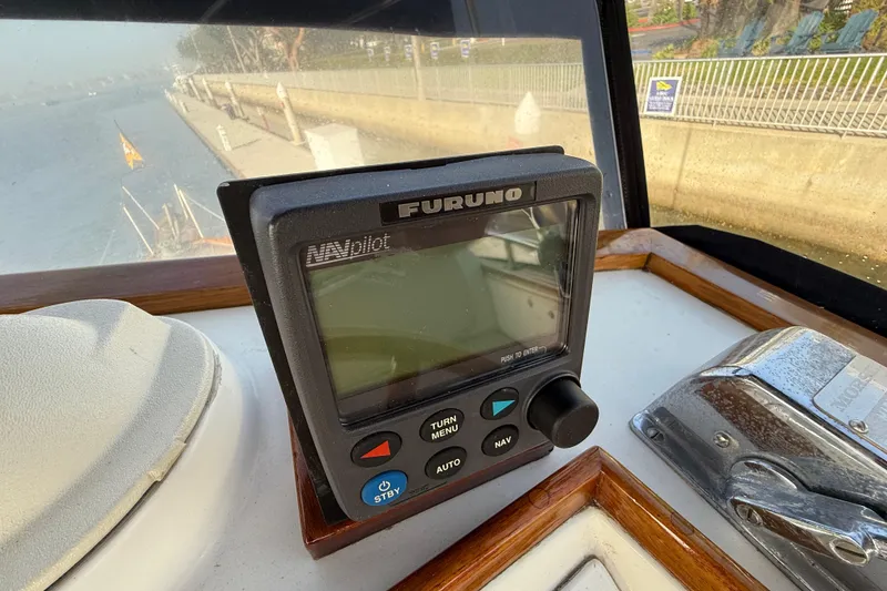 Slide: The Image of Furuno navigation system on 1982 Grand Banks 42 Motoryacht dashboard. - 43