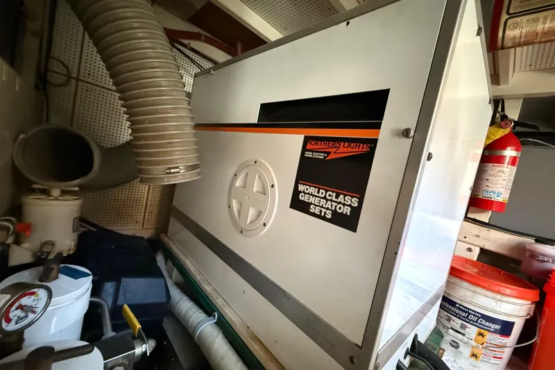 Slide: The Image of Engine room of 1982 Grand Banks 42 Motoryacht with Northern Lights generator. - 56