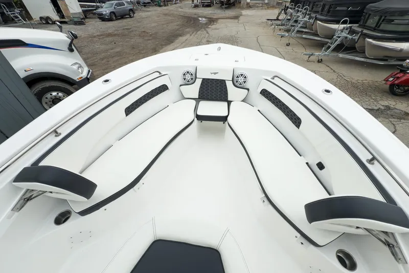Slide: The Image of Helm of 2026 Tidewater 220 LXF boat with modern controls and steering wheel. - 9