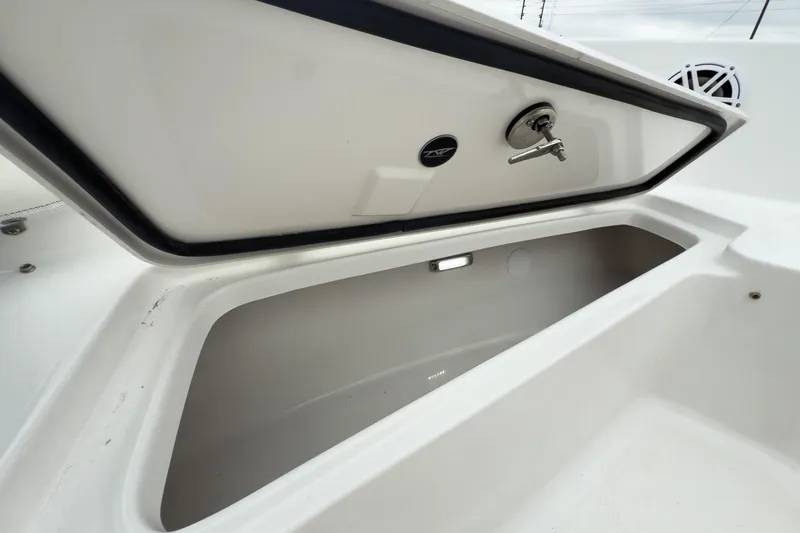 Slide: The Image of Open storage compartment on 2026 Tidewater 198 CC Adventure boat. - 14