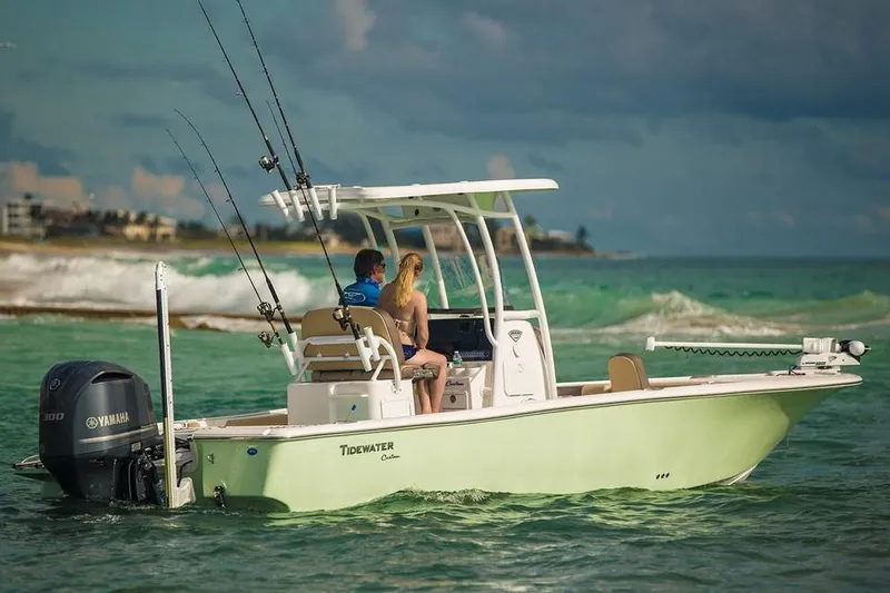 Slide: The Image of 2026 Tidewater 2500 Carolina Bay boat with spacious seating and sleek design. - 5