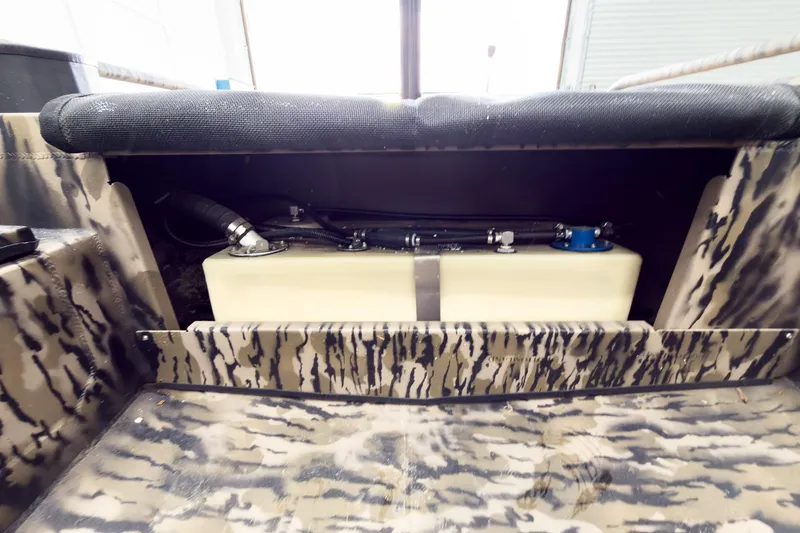 Slide: The Image of Interior view of 2026 Excel 1751 Viper F4 boat with camouflage design. - 16