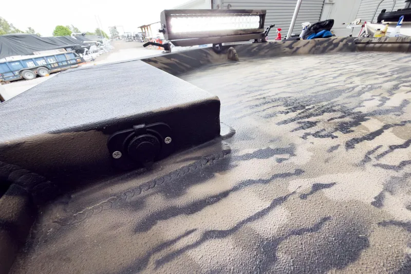 Slide: The Image of 2026 Excel 1751 Viper F4 boat deck with camouflage pattern and mounted light. - 18