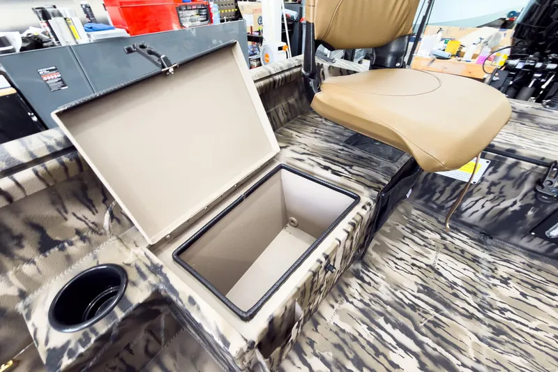 Slide: The Image of Interior of 2026 Excel 1751 Viper F4 boat with open storage compartment and seat. - 22