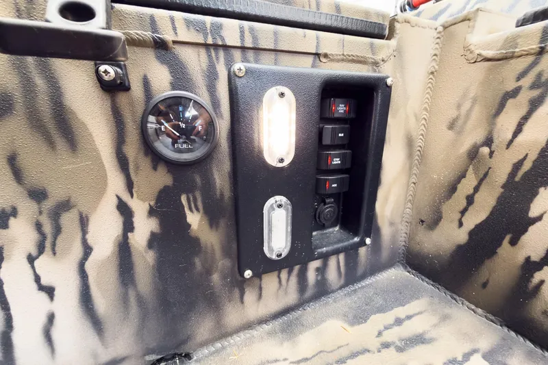 Slide: The Image of Control panel of 2026 Excel 1751 Viper F4 with fuel gauge and switches. - 24