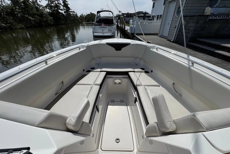 Slide: The Image of 2022 Sailfish 276 DC boat interior with spacious seating and sleek design. - 20