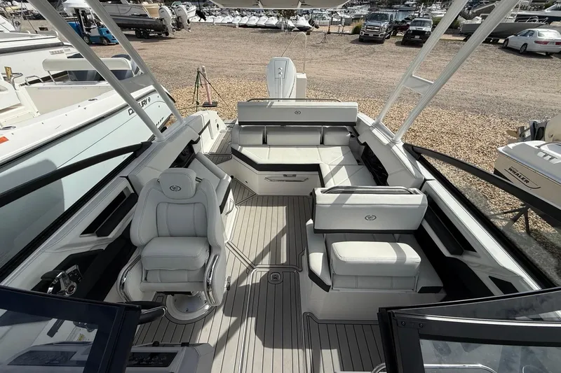 Slide: The Image of 2025 Cobalt R4 Outboard boat interior with luxurious seating and modern design. - 23