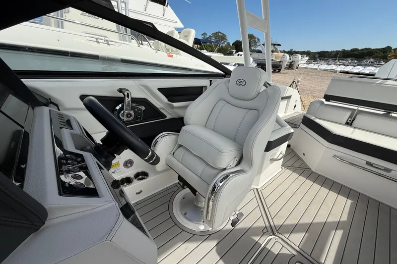 Slide: The Image of 2025 Cobalt R4 Outboard boat interior with luxurious seating and modern controls. - 30