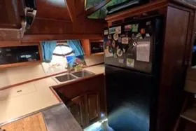 Slide: The Image of Interior of 1987 Californian 45 Motor Yacht kitchen with fridge and sink. - 40