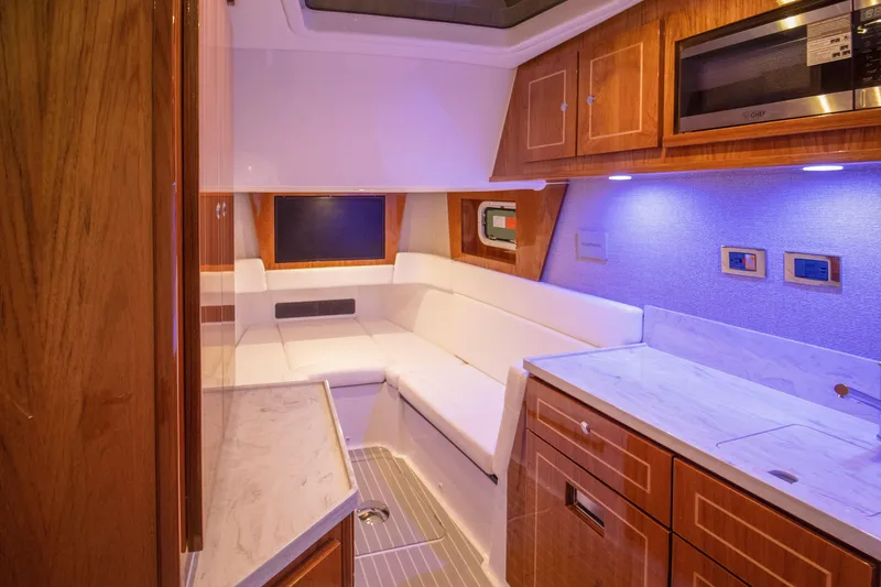 Slide: The Image of Luxurious interior of 2026 HCB 48 Campeon yacht with modern amenities and elegant design. - 7