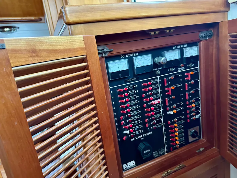 Slide: The Image of 1999 Kadey-Krogen 39 helm with wooden wheel and control panel. - 20