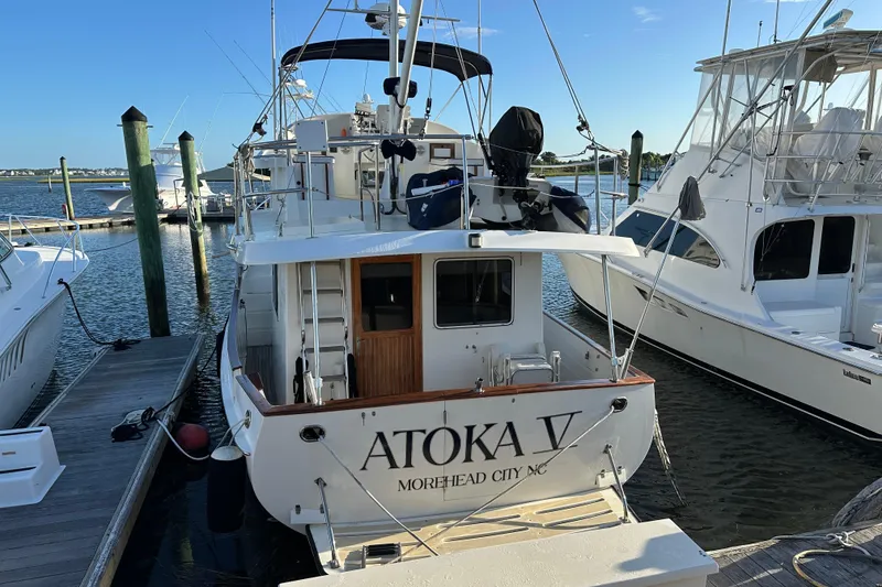 Slide: The Image of Aerial view of a 1999 Kadey-Krogen 39 yacht docked among other boats. - 3
