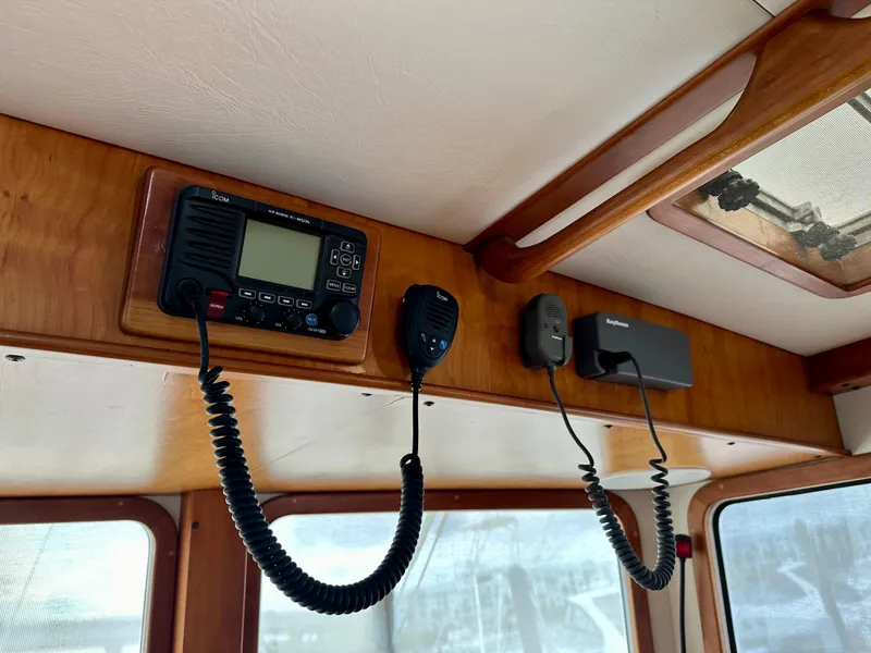 Slide: The Image of Interior view of a 1999 Kadey-Krogen 39 boat with communication equipment. - 24