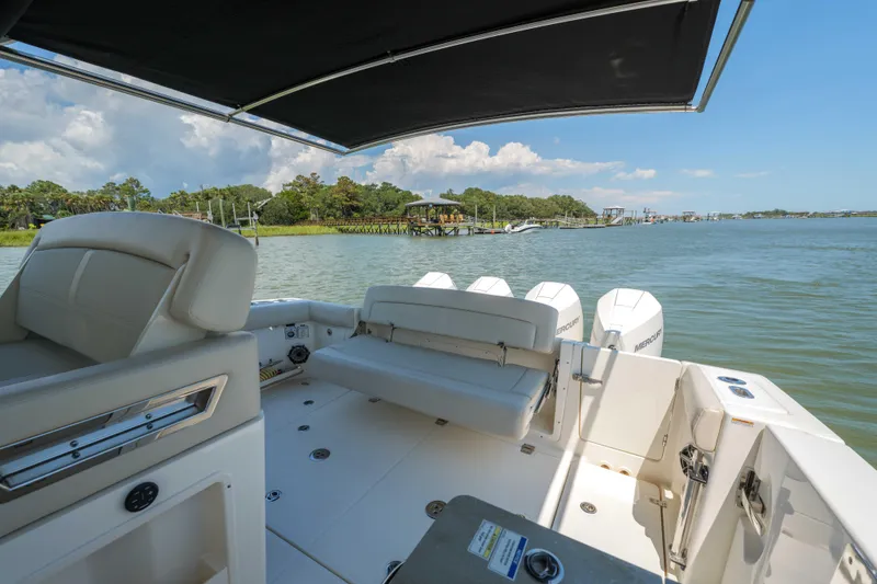 Slide: The Image of Boston Whaler 380 Realm- Cockpit Seating - 14