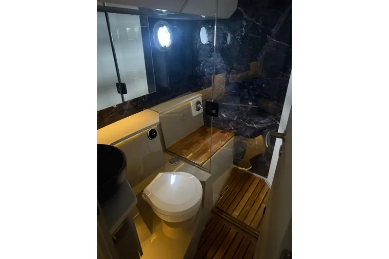Slide: The Image of Modern bathroom in 2025 Hanover 447 yacht with wooden accents and glass shower. - 43
