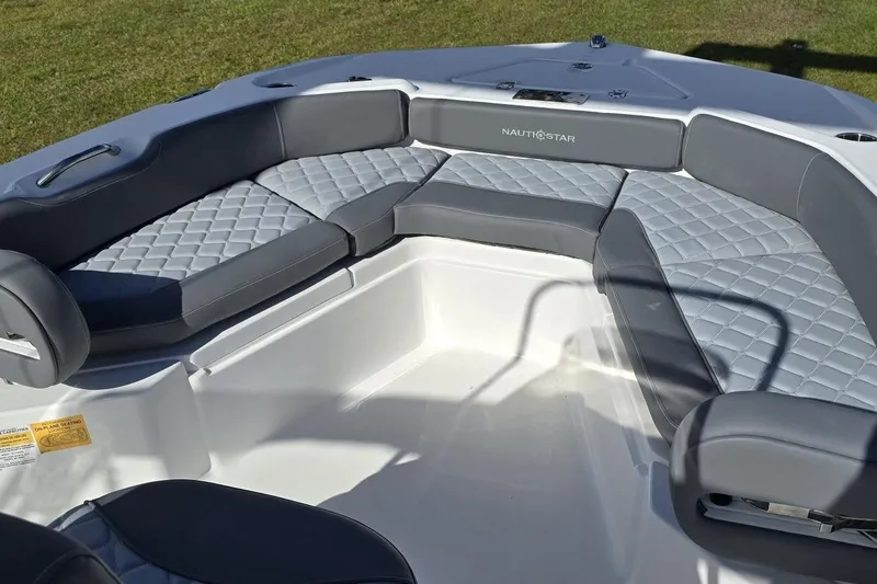 Slide: The Image of 2026 NauticStar 191 Hybrid boat interior with gray quilted seating. - 12
