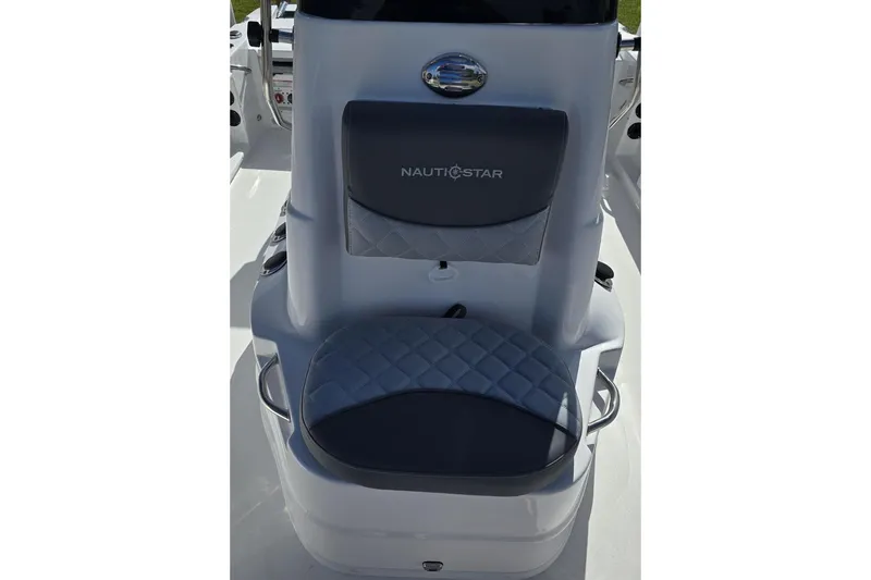 Slide: The Image of 2026 NauticStar 191 Hybrid boat seat with quilted design and logo. - 8