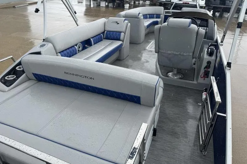 Slide: The Image of 2022 Bennington 26 LXSB pontoon boat with spacious seating and modern design. - 15