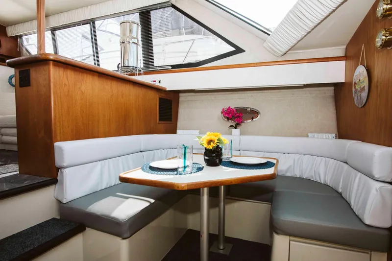 Slide: The Image of Compact kitchen in 1991 Carver 36 Aft Cabin Motor Yacht with stove, microwave, and sink. - 11