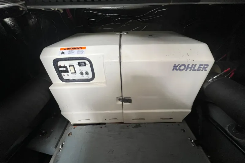 Slide: The Image of Engine of 1991 Carver 36 Aft Cabin Motor Yacht, painted bright blue. - 18