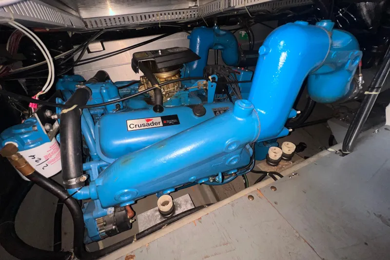 Slide: The Image of 1991 Carver 36 Aft Cabin Motor Yacht docked at marina under clear sky. - 21