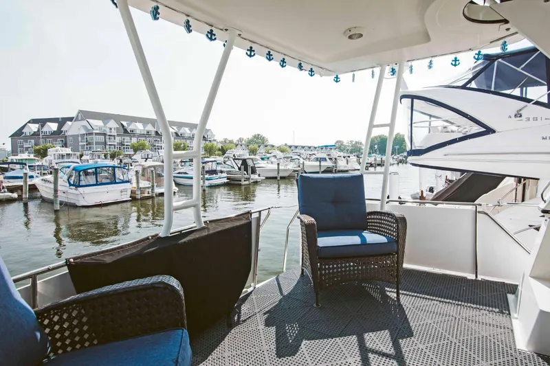 Slide: The Image of Interior of 1991 Carver 36 Aft Cabin Motor Yacht with cozy bedroom and bathroom. - 4