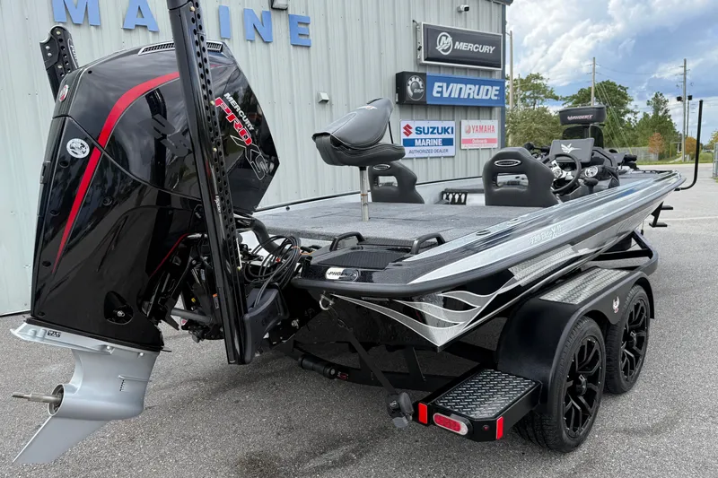 Slide: The Image of 2026 Phoenix 920 ELITE X II boat engine with Power-Pole anchors on a trailer. - 19