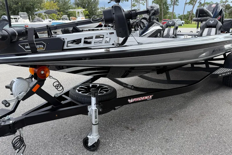 Slide: The Image of 2026 Phoenix 920 Elite X II boat with sleek design and modern seating. - 3