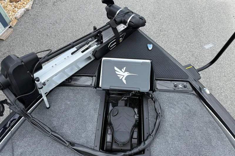 Slide: The Image of 2026 Phoenix 920 ELITE X II boat interior with seating and storage compartments. - 6