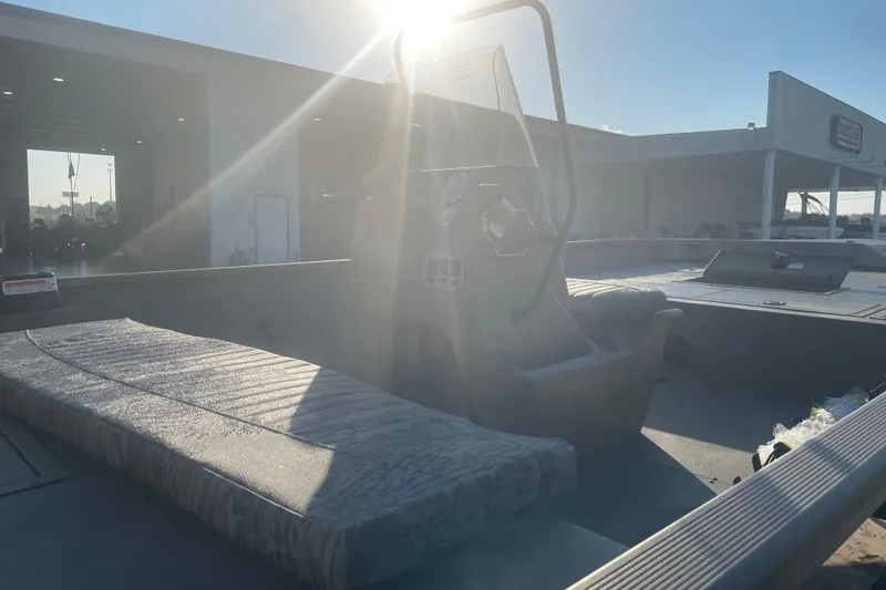 Slide: The Image of 2026 Tracker Grizzly 2072 CC boat interior with sunlight streaming through. - 5