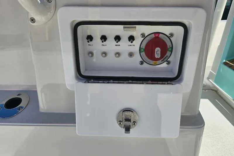 Slide: The Image of Control panel on a 2025 Ranger 2510 Bay boat with switches and gauge. - 15