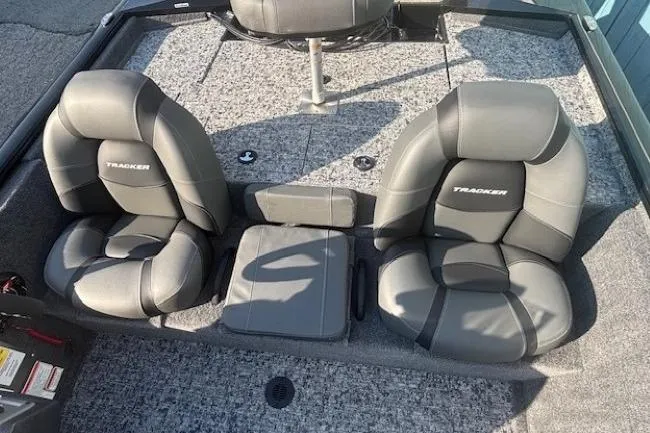 Slide: The Image of 2026 Tracker Pro Team 195 boat seats, gray upholstery, spacious layout. - 11